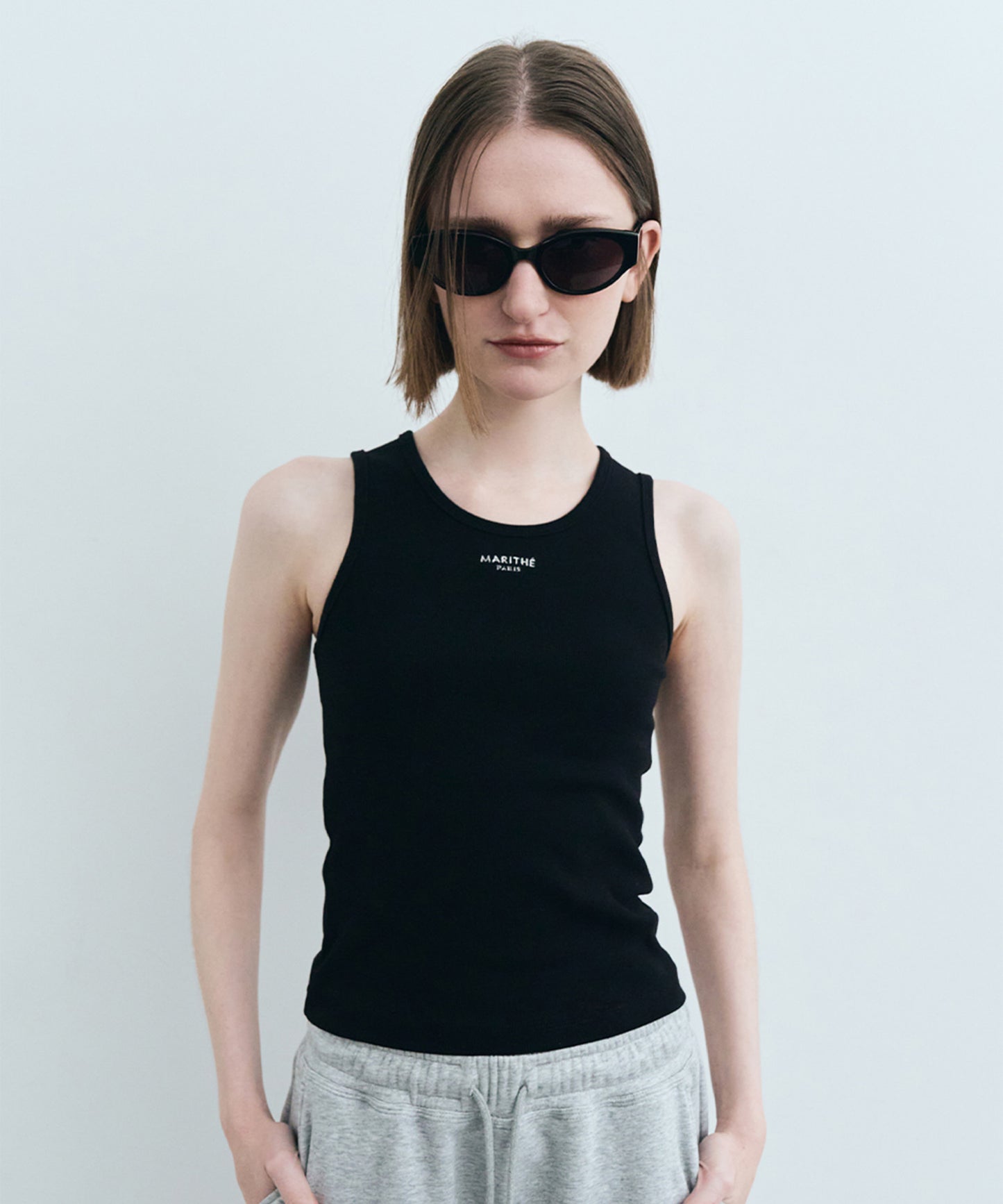 W U NECK SLEEVELESS